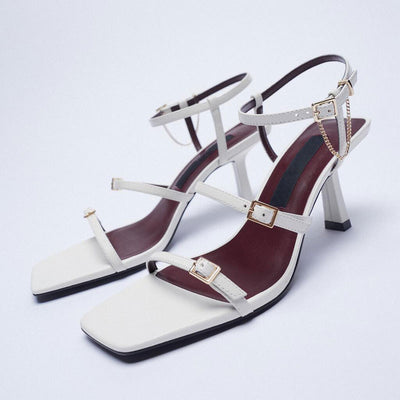 Beautiful White Three Step Stiletto Shoes, Three Strap, Buckle Closure, Square Toe, front side view.